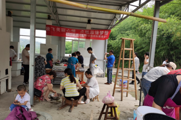 The company organizes team-building activities—self-service cooking